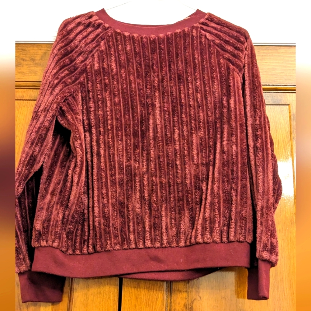 Women's medium sized soft maroon shirt